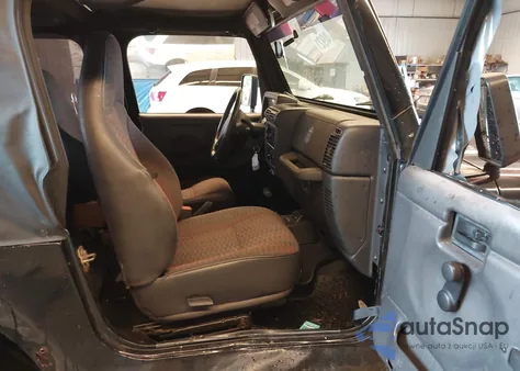 2000 Jeep Wrangler Sport z USA, uszkodzony, nr VIN 1J4FA49S3YP716715